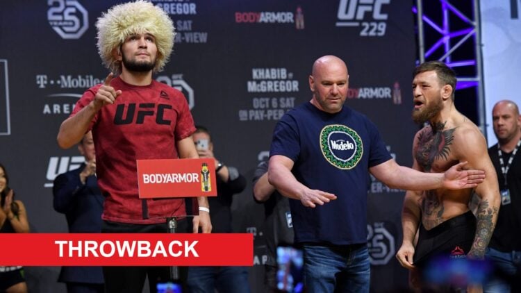 Conor McGregor is held back by Dana White as he confronts Khabib Nurmagomedov at the UFC 229 weigh in