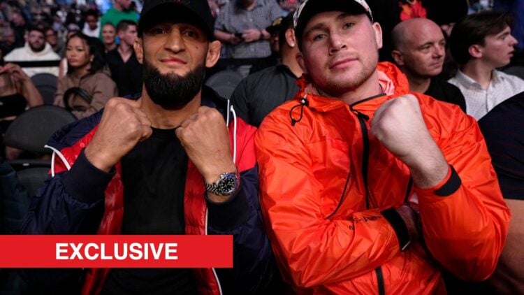 Khamzat Chimaev and Darren Till pose with fists up at a fight