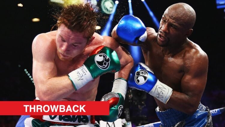 Floyd Mayweather lands a right hand on Canelo Alvarez during boxing fight
