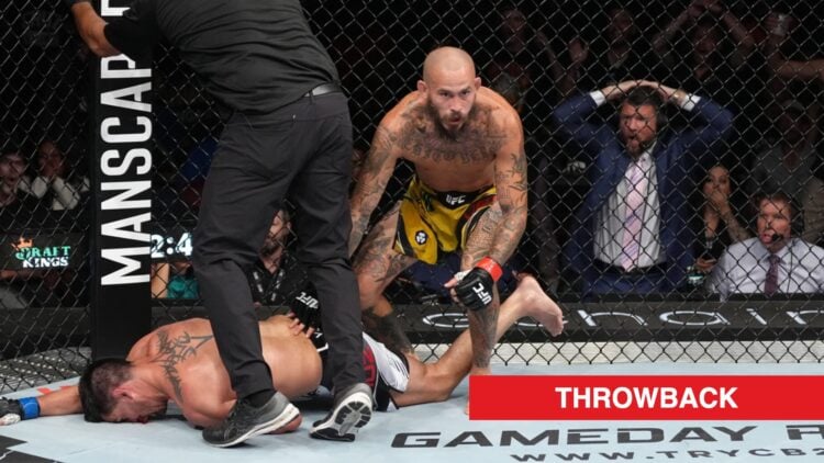 Marlon Vera stands over Dominick Cruz after knocking him out with a head kick in their fight at UFC San Diego