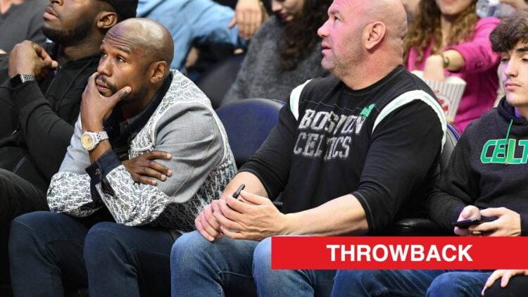 Boxer Floyd Mayweather Jr. and UFC President Dana White seated together during the Los Angeles Clippers and the Boston Celtics basketball game at S...
