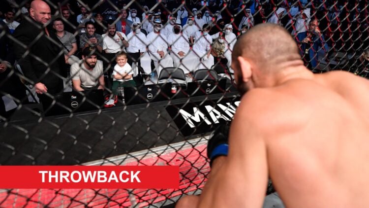 Khamzat Chimaev stars at Dana White at cageside at UFC 267