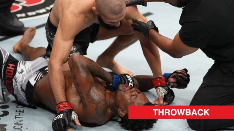 Khamzat Chimaev interacts with Kevin Holland after submitting him in their fight at UFC 279