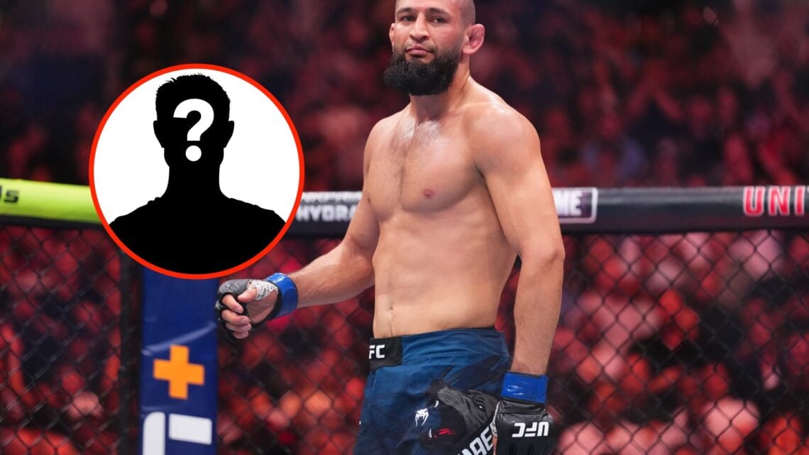 Insert: Mystery Fighter Center: Khamzat Chimaev in the Octagon during his middleweight title fight with Dricus du Plessis at UFC 319 in Chicago, Il...