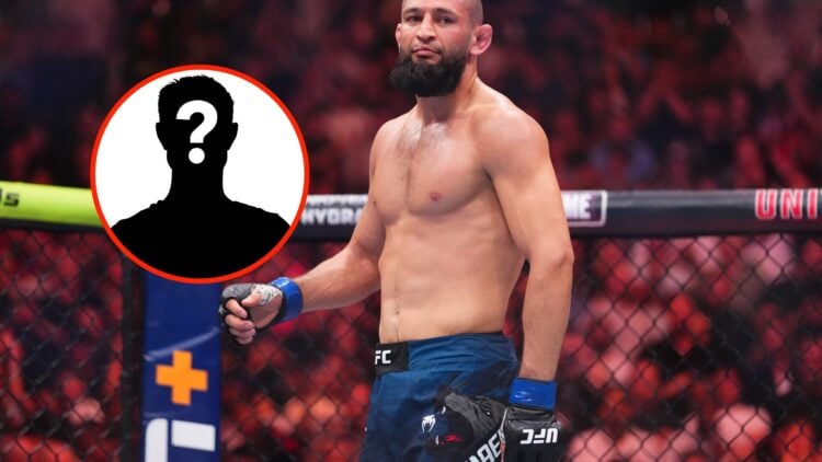 Insert: Mystery Fighter Center: Khamzat Chimaev in the Octagon during his middleweight title fight with Dricus du Plessis at UFC 319 in Chicago, Il...