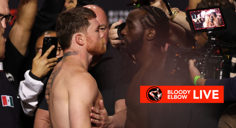 Canelo Alvarez and Terence Crawford facing off shirtless at their final weigh-in