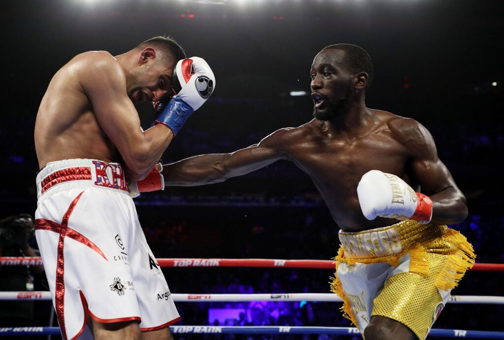 Terence Crawford punching Amir Khan