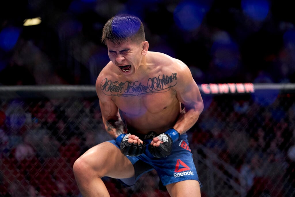 Mario Bautista celebrating win at UFC 247