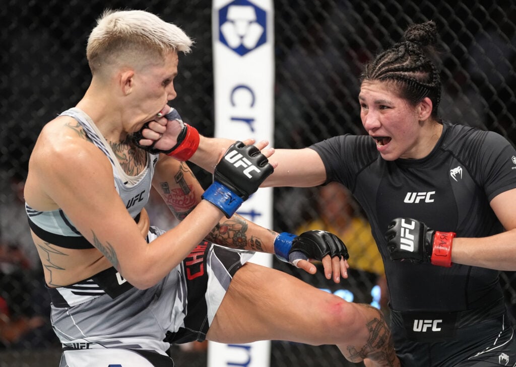 Irene Aldana punches Macy Chiasson at UFC 279