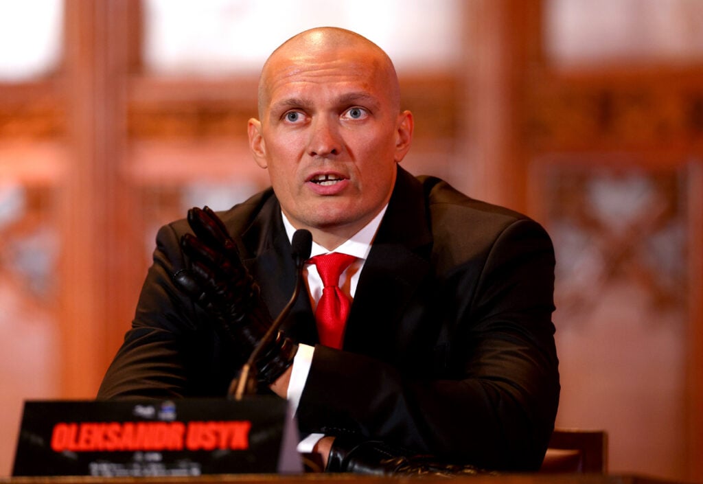 Oleksandr Usyk attends a press conference ahead of his undisputed heavyweight title rematch with Tyson Fury in December, 2024.