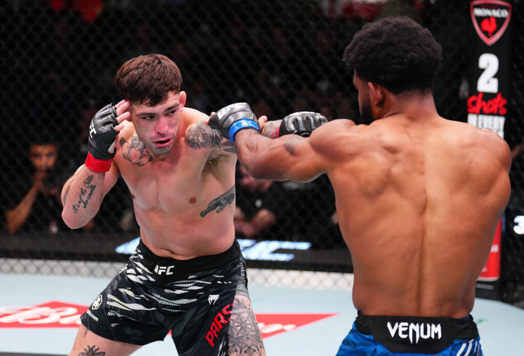 Preston Parsons throws a punch at Jacobe Smith