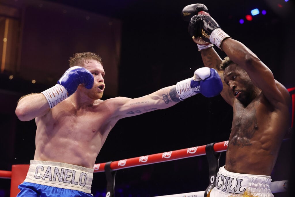 William Scull dodges a punch from Canelo Alvarez