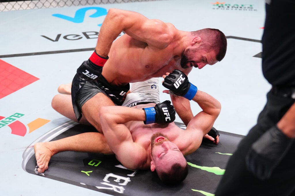 Mateusz Gamrot on top of Ludovit Klein during UFC fight