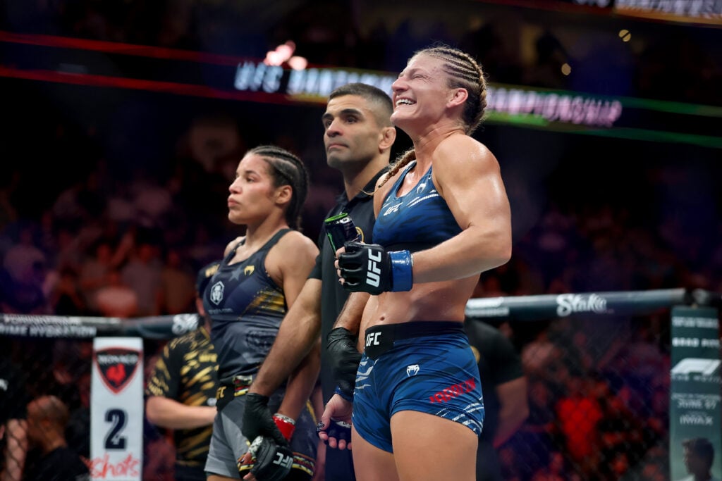 Kayla Harrison celebrates submission win over Julianna Pena at UFC 316