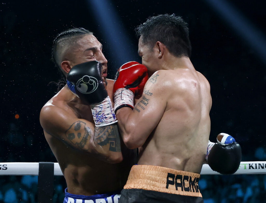 Manny Pacquiao and Mario Barrios come together during their 2025 fight