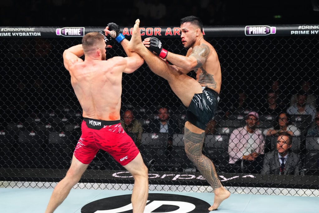 Brad Tavares attempts a head kick at UFC Paris