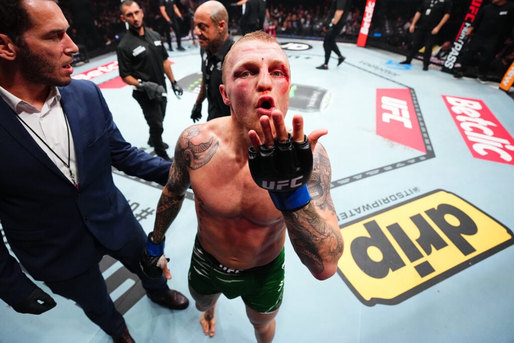 Mason Jones celebrates after beating Bolaji Oki at UFC Paris