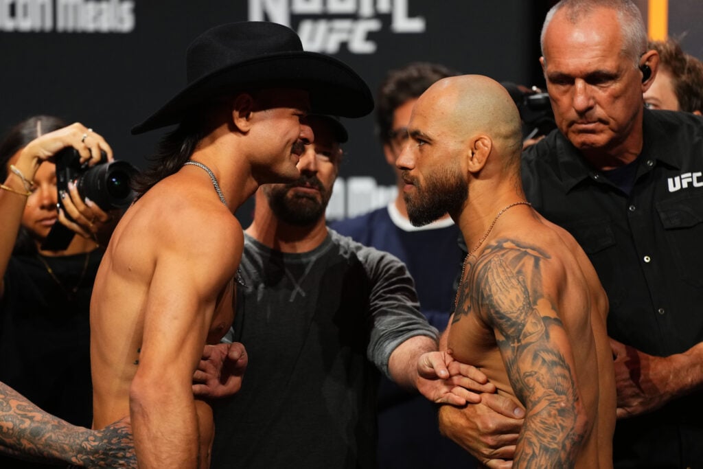 Jean Silva stares down Diego Lopes at Noche UFC weigh-ins