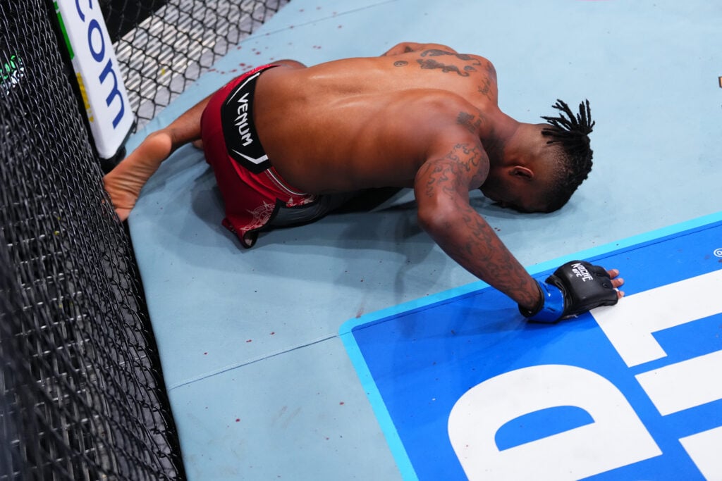 Sedriques Dumas reacts after being kicked low by Zachary Reese at Noche UFC