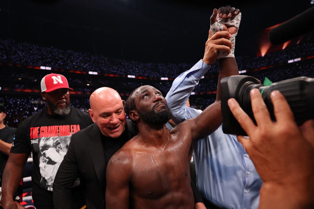 Dana White awards the belt to Terence Crawford after his win over Canelo Alvarez