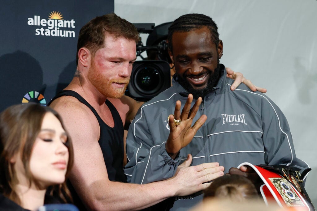 Terence Crawford speaks with Canelo Alvarez following their undisputed super middleweight title fight in September, 2025.
