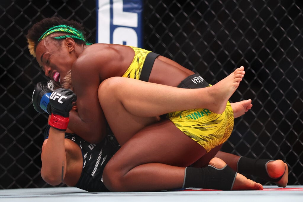 Alexia Thainara attempts a can opener submission on Loma Lookboonme