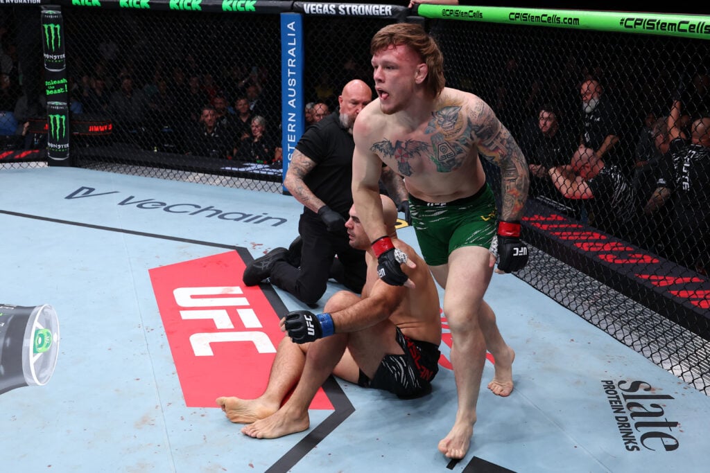 Jimmy Crute celebrates submission win over Ivan Erslan