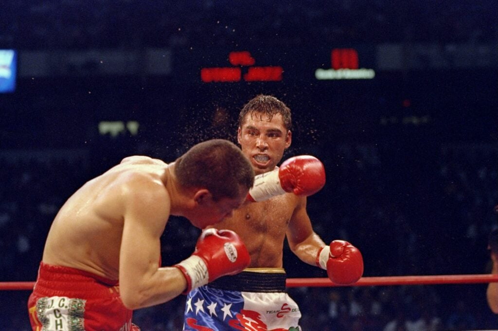 Oscar De La Hoya hits Julio Cesar Chavez with a right hand