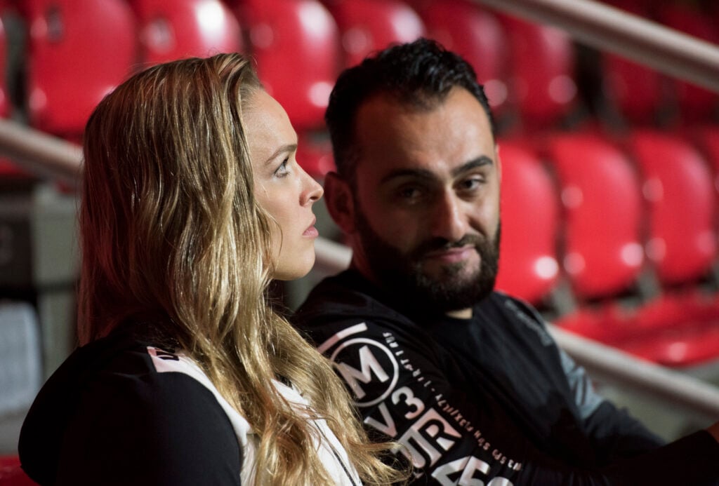 Ronda Rousey next to coach Edmond Tarverdyan at the UFC 190 Weigh-in