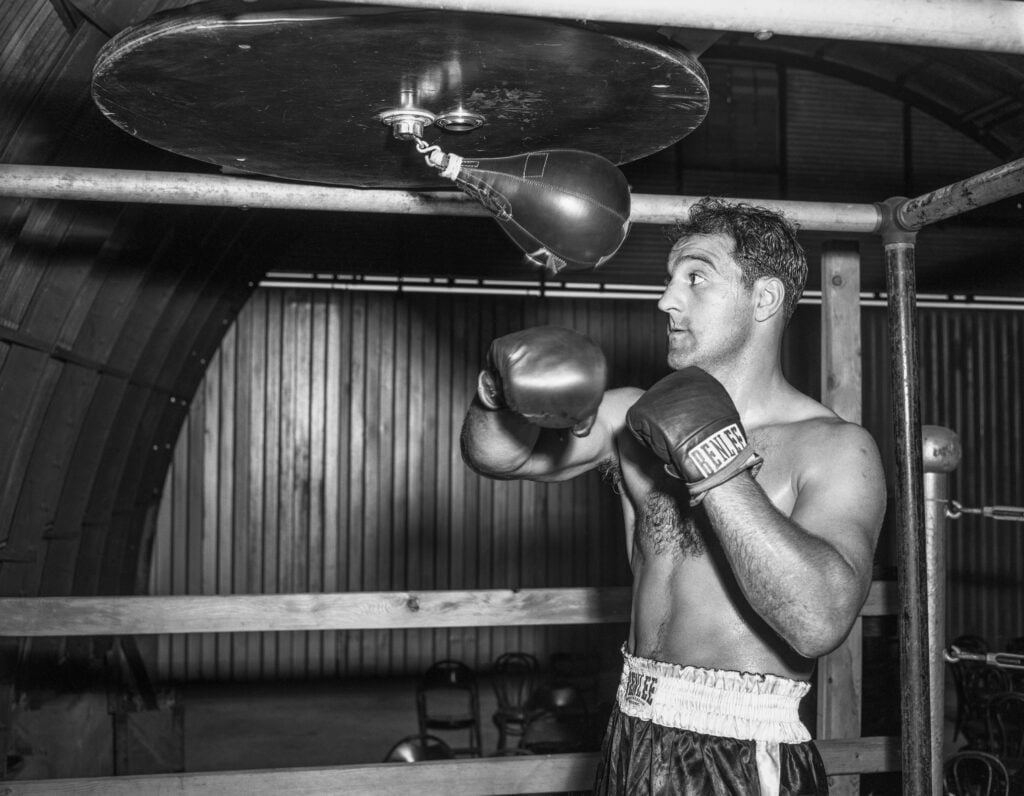 Rocky Marciano hits a speed back during a 1955 session