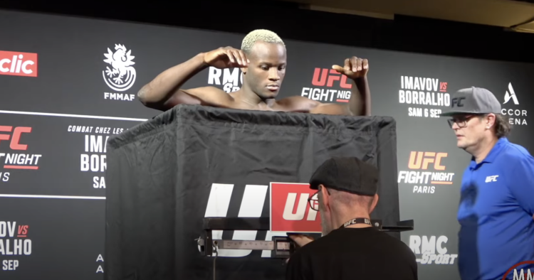 Losene Keita weighs in behind a UFC curtain