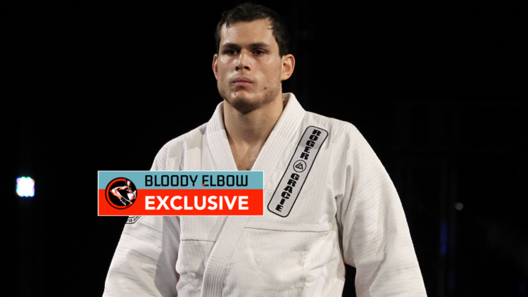 Roger Gracie in his BJJ Gi with exclusive banner