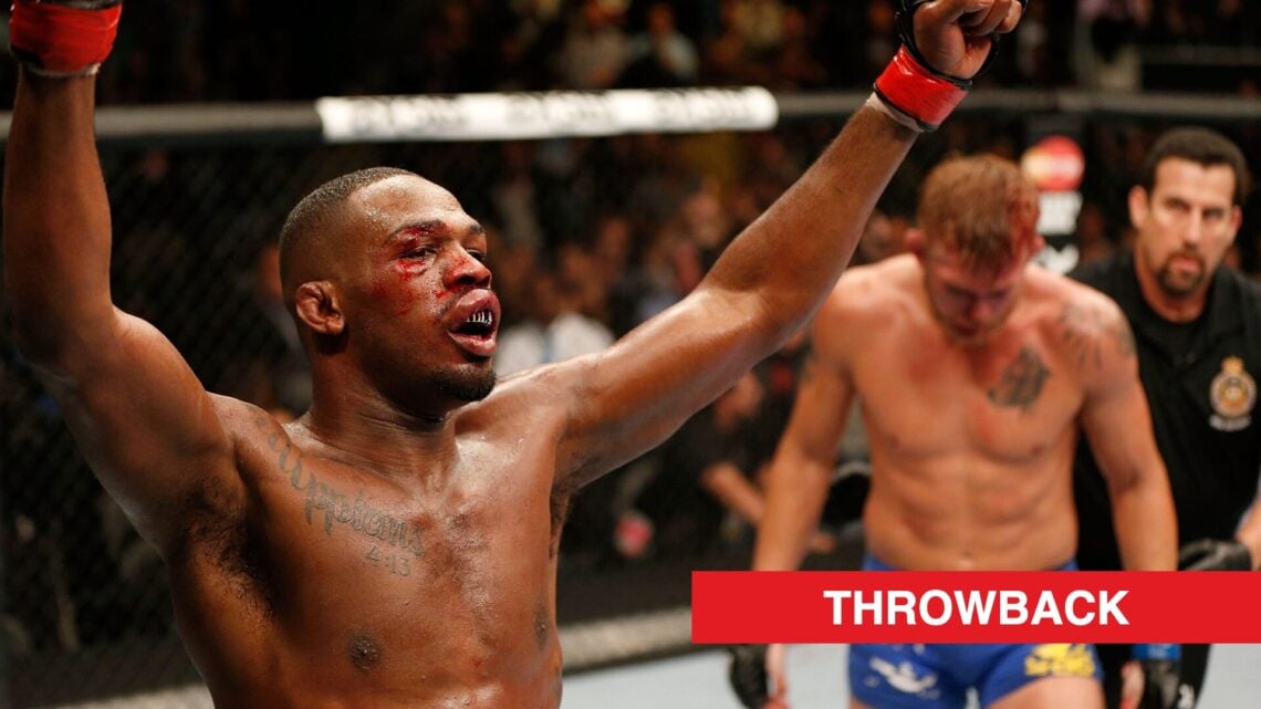 Jon Jones celebrates after beating Alexander Gustafsson at UFC 165