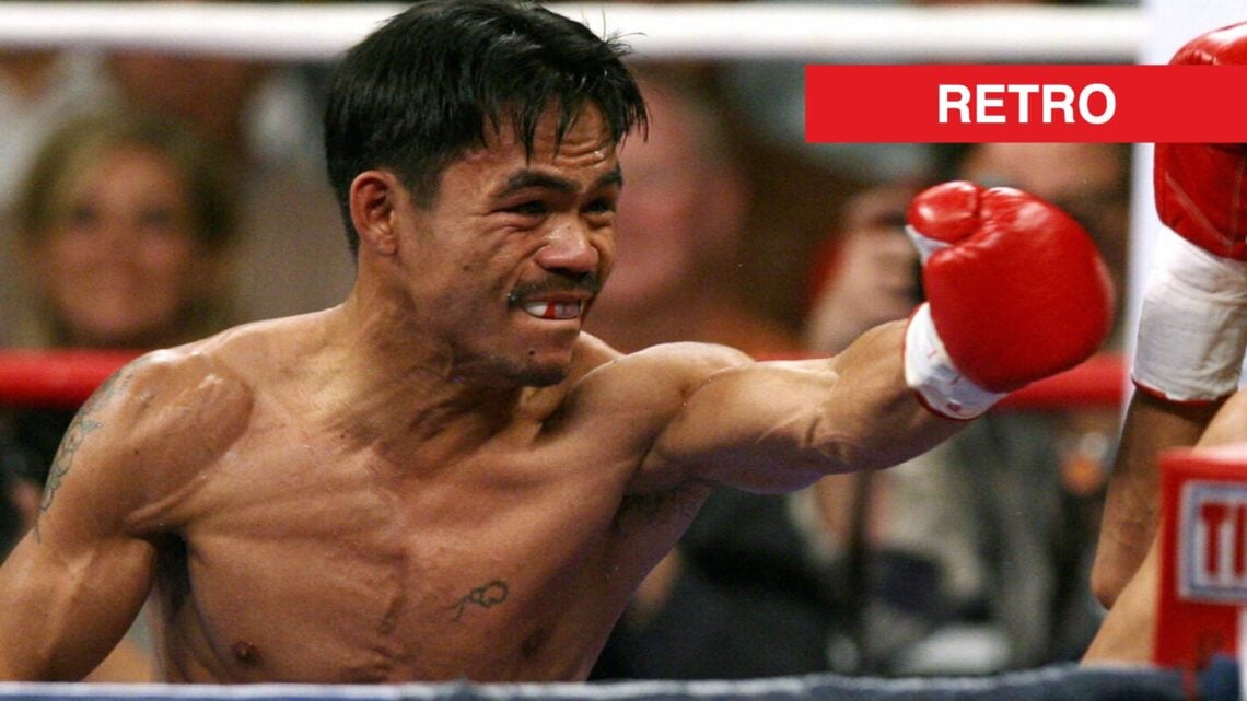 Manny Pacquiao throws a punch at Erik Morales during their trilogy fight in November 2006.