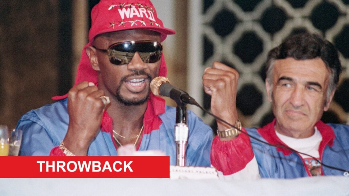 Marvin Hagler raises his fists during a press conference in Las Vegas, Nevada.