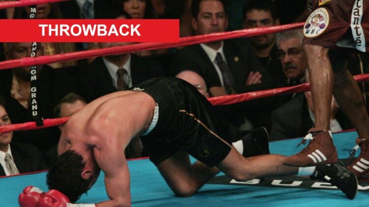 Oscar De La Hoya is knocked to the mat by Bernard Hopkins