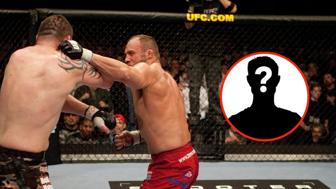 Randy Couture punches Tim Sylvia with a mystery insert