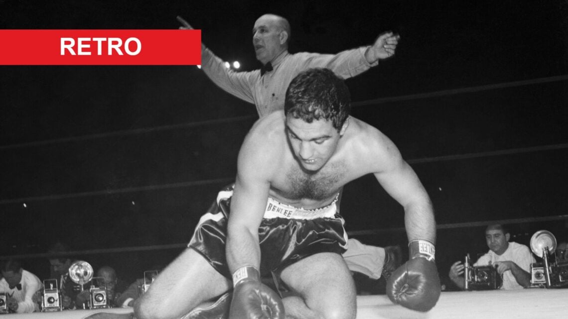 Rocky Marciano Rises from Canvas after being knocked down