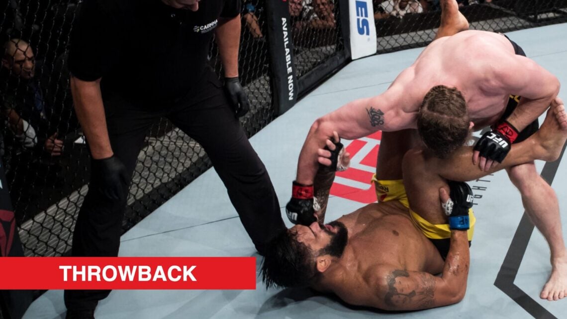 Roy Nelson punches Antonio Silva during their fight at UFC Brasilia