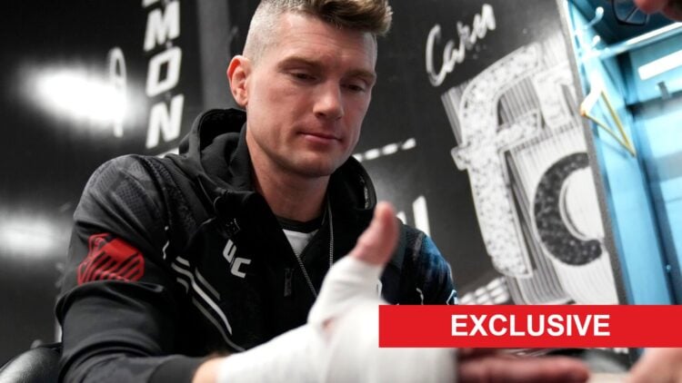 Stephen Thompson has his hands wrapped ahead of his fight with Shavkat Rakhmonov at UFC 296, inset exclusive banner