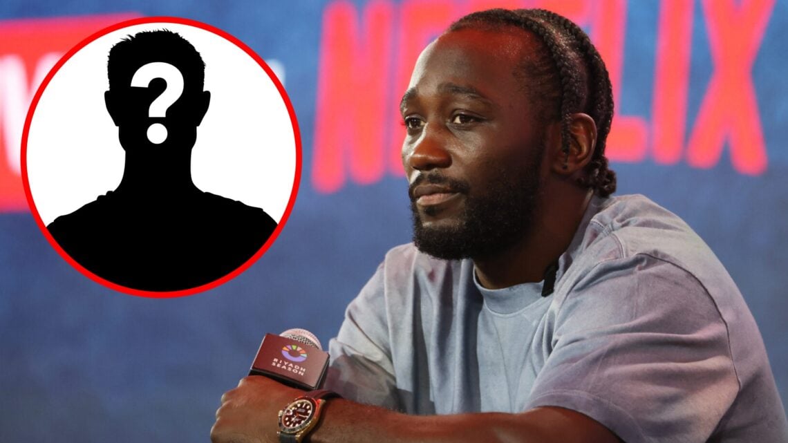 Terence Crawford on stage at a press conference at Fanatics Fest, inset mystery icon