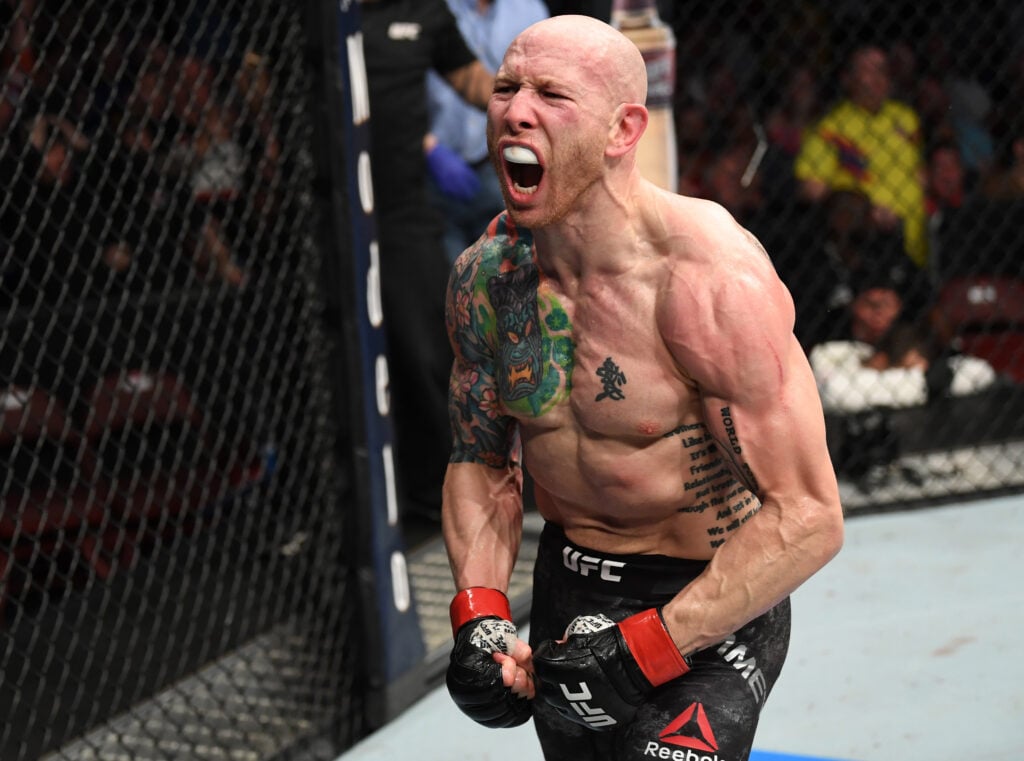 Josh Emmett yells after knocking out Michael Johnson