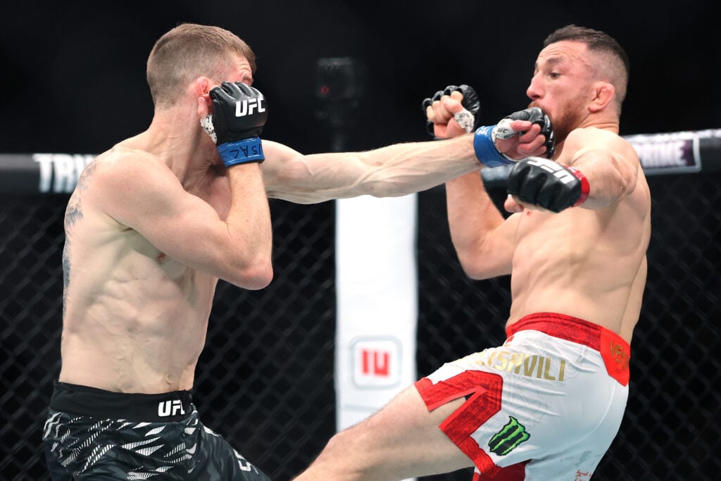 Cory Sandhagen punches Merab Dvalishvili at UFC 320