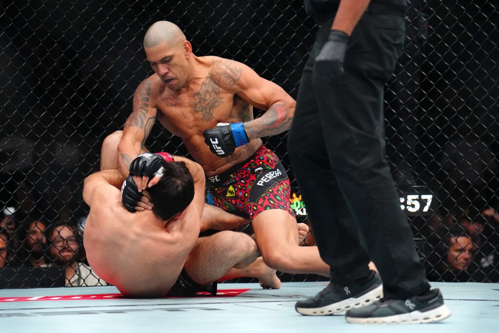 Alex Pereira punches Magomed Ankalaev at UFC 320