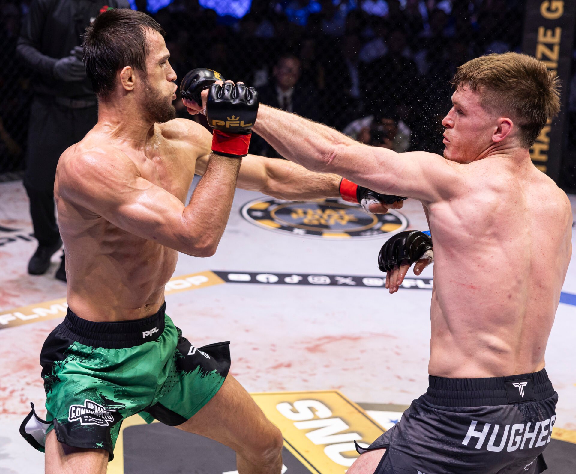 Paul Hughes punches Usman Nurmagomedov in their rematch