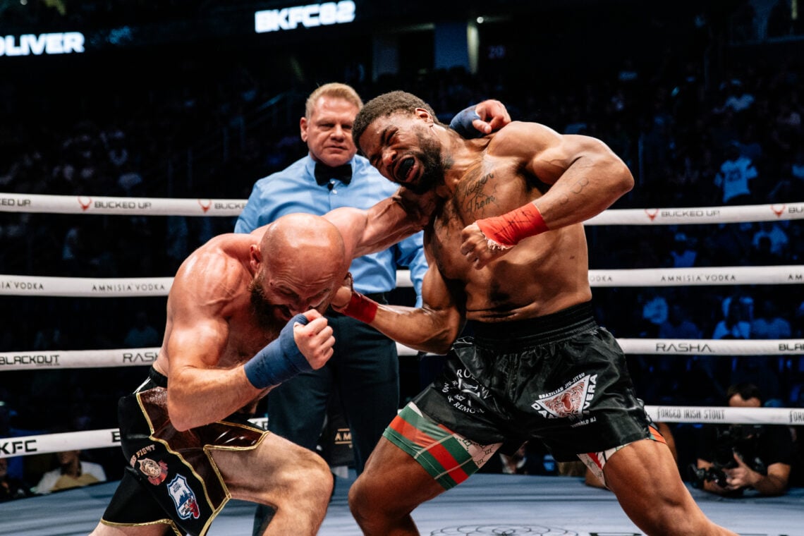 Jmani Oliver throws a punch at Irakli Ghvinjilia during their lightweight fight at BKFC 82 in Newark, New Jersey