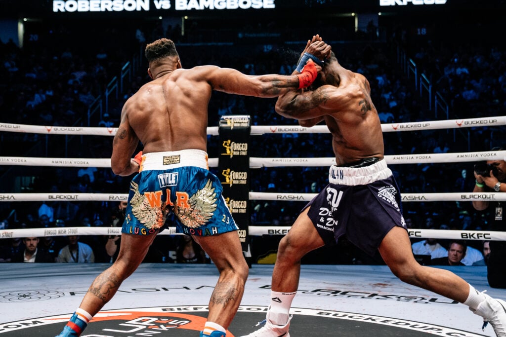 Oluwale Bamgbose throws a punch at Karl Roberson during their catchweight fight at BKFC 82 in Newark, New Jersey.