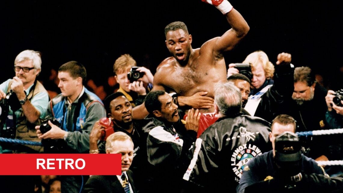 Lennox Lewis celebrates in the ring after his WBC heavyweight title fight with Frank Bruno in October, 1993.