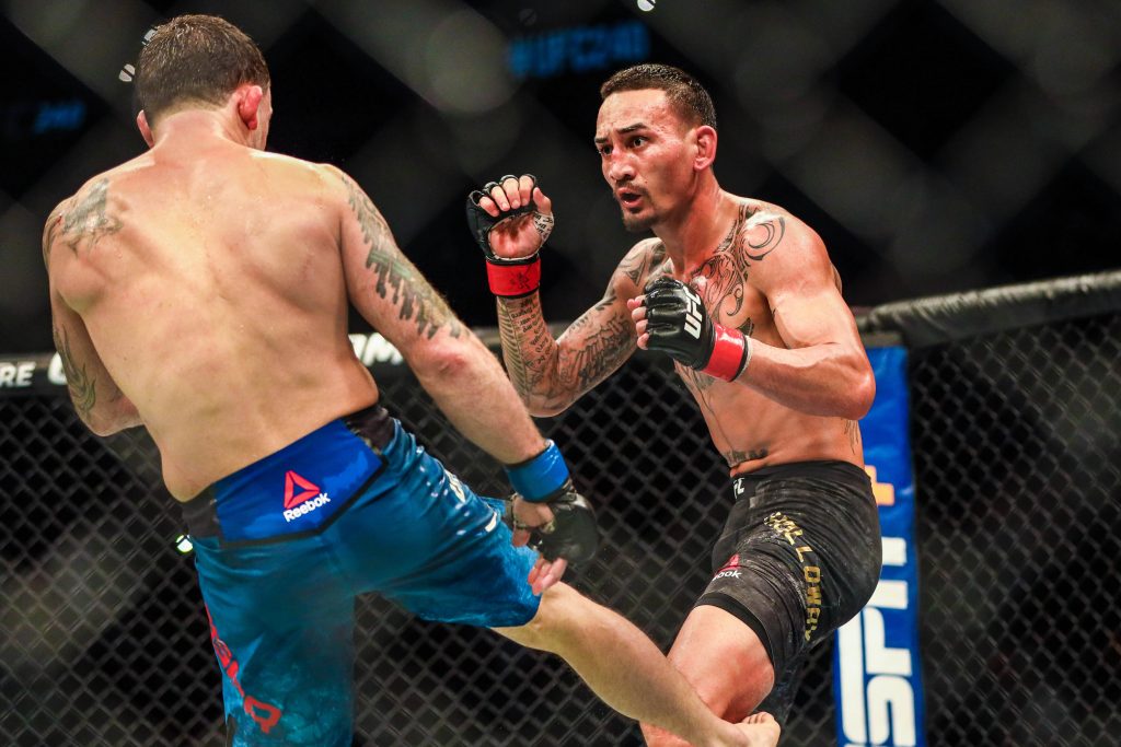Max Holloway vs. The Korean Zombie Chan Sung Jung headlines tonight's UFC fight night card