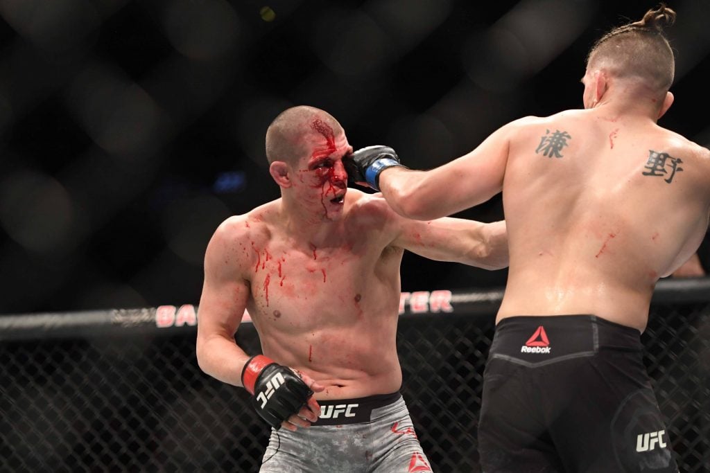 MMA: UFC 223- Joe Lauzon vs Chris Gruetzemacher, Apr 7, 2018; Brooklyn, NY, USA; Joe Lauzon (Red gloves) fights Chris Gruetzemacher (Blue gloves) during UFC 223 at Barclays Center. Mandatory Credit: Dennis Schneidler-USA TODAY Sports, 07.04.2018 22:28:38, 10775218, Chris Gruetzemacher, Barclays Center, MMA, Joe Lauzon PUBLICATIONxINxGERxSUIxAUTxONLY Copyright: xDennisxSchneidlerx 10775218